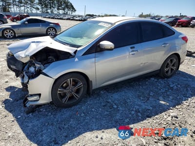 2016 FORD FOCUS SE 1FADP3FE6GL218959 - główne zdjęcie licytacji z USA - miniatura
