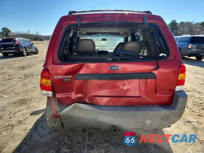 Zdjęcie 6 z 13 samochodu: 2001 FORD ESCAPE XLT VIN:1FMYU04171KB73025 - miniatura