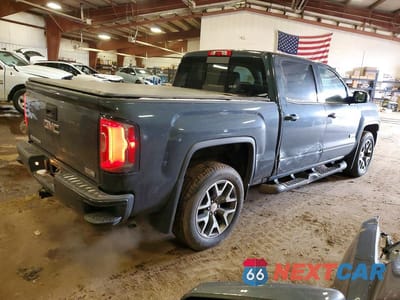 Trzecie zdjęcie samochodu z tyłu: 2017 GMC SIERRA K1500 SLT VIN:3GTU2NEC9HG361942 - miniatura