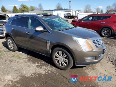 Czwarte zdjęcie samochodu z boku: 2014 CADILLAC SRX LUXURY COLLECTION VIN:3GYFNEE32ES561435 - miniatura