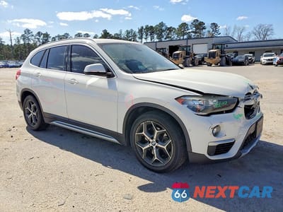 Czwarte zdjęcie samochodu z boku: 2018 BMW X1 XDRIVE28I VIN:WBXHT3C31J5L27192 - miniatura