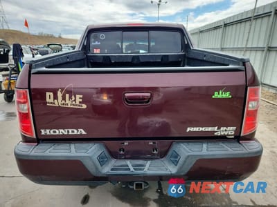 Zdjęcie 6 z 12 samochodu: 2010 HONDA RIDGELINE RTL VIN:5FPYK1F53AB012630 - miniatura