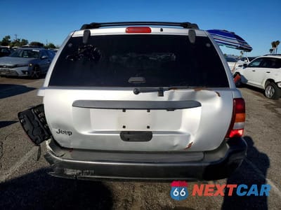 Zdjęcie 6 z 13 samochodu: 2004 JEEP GRAND CHEROKEE LAREDO VIN:1J4GX48S84C301234 - miniatura