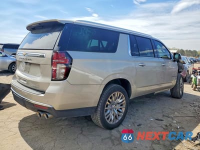 Trzecie zdjęcie samochodu z tyłu: 2021 CHEVROLET SUBURBAN C1500 PREMIER VIN:1GNSCFKD2MR164541 - miniatura