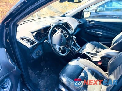 Czwarte zdjęcie samochodu z boku: 2014 FORD ESCAPE TITANIUM VIN:1FMCU9J98EUA54984 - miniatura