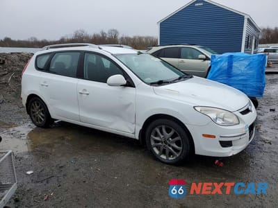 Czwarte zdjęcie samochodu z boku: 2012 HYUNDAI ELANTRA TOURING GLS VIN:KMHDC8AE3CU130655 - miniatura