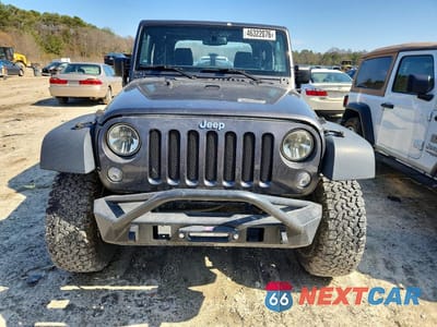 Piąte zdjęcie samochodu w środku: 2017 JEEP WRANGLER SPORT VIN:1C4AJWAG9HL547701 - miniatura
