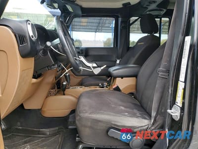 Zdjęcie 7 z 12 samochodu: 2014 JEEP WRANGLER UNLIMITED SAHARA VIN:1C4BJWEG3EL118290 - miniatura