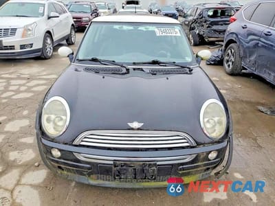 Piąte zdjęcie samochodu w środku: 2003 MINI COOPER VIN:WMWRC33403TC39761 - miniatura