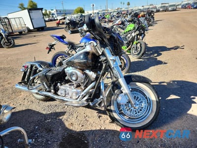 2006 HARLEY-DAVIDSON FLHXI 1HD1KBW136Y682410 - główne zdjęcie licytacji z USA - miniatura
