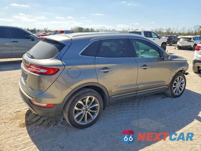 Trzecie zdjęcie samochodu z tyłu: 2016 LINCOLN MKC SELECT VIN:5LMCJ2C99GUJ24621 - miniatura