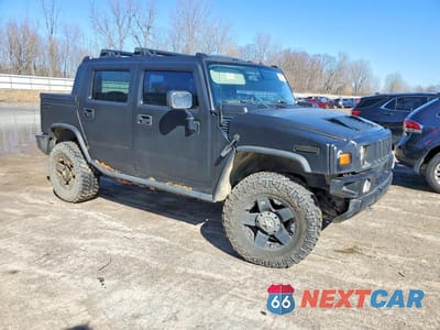 Czwarte zdjęcie samochodu z boku: 2005 HUMMER H2 SUT VIN:5GRGN22U65H123451 - miniatura