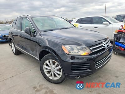 Czwarte zdjęcie samochodu z boku: 2013 VOLKSWAGEN TOUAREG V6 TDI VIN:WVGEP9BP0DD006598 - miniatura