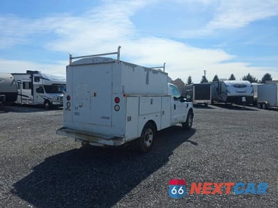 Czwarte zdjęcie samochodu z boku: 2009 FORD F250 SUPER DUTY BOX TRUCK VIN:1FDNF20599EA97786 - miniatura