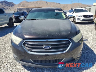 Piąte zdjęcie samochodu w środku: 2014 FORD TAURUS LIMITED VIN:1FAHP2F84EG137972 - miniatura