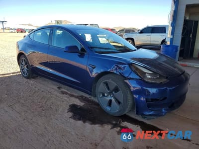 Czwarte zdjęcie samochodu z boku: 2023 TESLA MODEL 3 VIN:5YJ3E1EA4PF680194 - miniatura