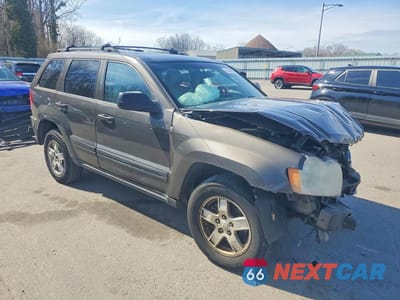 Czwarte zdjęcie samochodu z boku: 2006 JEEP GRAND CHEROKEE LAREDO VIN:1J4HR48N46C335926 - miniatura