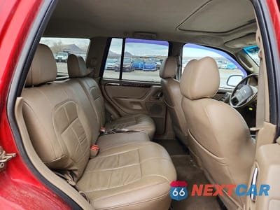Zdjęcie 10 z 12 samochodu: 2002 JEEP GRAND CHEROKEE LIMITED VIN:1J4GW58J12C281213 - miniatura