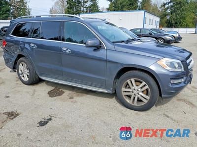 Czwarte zdjęcie samochodu z boku: 2015 MERCEDES-BENZ GL 350 BLUETEC VIN:4JGDF2EEXFA484953 - miniatura