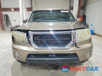 Piąte zdjęcie samochodu w środku: 2011 HONDA PILOT EX VIN:5FNYF4H41BB012436 - miniatura