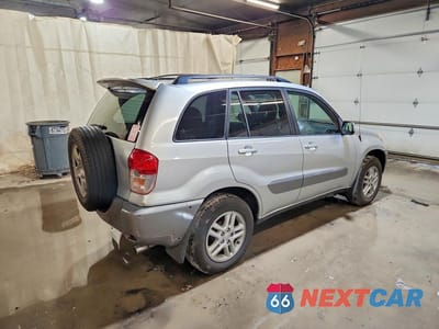 Trzecie zdjęcie samochodu z tyłu: 2001 TOYOTA RAV4 BASE VIN:JTEGH20V610010043 - miniatura