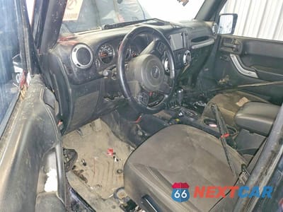 Zdjęcie 8 z 13 samochodu: 2015 JEEP WRANGLER UNLIMITED SAHARA VIN:1C4BJWEG8FL509209 - miniatura