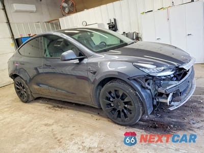 Czwarte zdjęcie samochodu z boku: 2022 TESLA MODEL Y VIN:7SAYGDEE6NF445283 - miniatura
