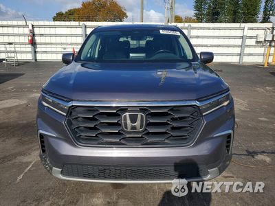 Piąte zdjęcie samochodu w środku: 2023 HONDA PILOT EXL VIN:5FNYG1H49PB050614 - miniatura
