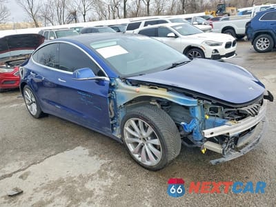 Czwarte zdjęcie samochodu z boku: 2020 TESLA MODEL 3 VIN:5YJ3E1EB7LF620512 - miniatura