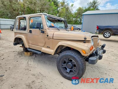 Czwarte zdjęcie samochodu z boku: 1999 JEEP WRANGLER / TJ SAHARA VIN:1J4FY49S4XP450485 - miniatura