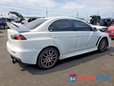 Trzecie zdjęcie samochodu z tyłu: 2014 MITSUBISHI LANCER EVOLUTION GSR VIN:JA32W8FV8EU017054 - miniatura