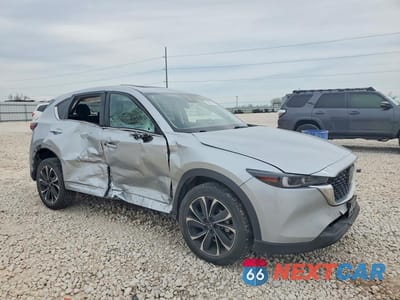 Czwarte zdjęcie samochodu z boku: 2023 MAZDA CX-5 PREMIUM PLUS VIN:JM3KFBEM5P0139752 - miniatura