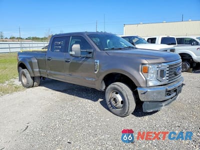 Czwarte zdjęcie samochodu z boku: 2021 FORD F350 SUPER DUTY VIN:1FT8W3DT0MED43682 - miniatura