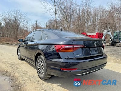 Trzecie zdjęcie samochodu z tyłu: 2019 VOLKSWAGEN JETTA SEL VIN:3VWE57BU0KM263389 - miniatura