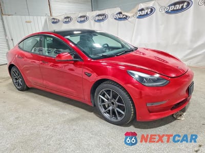 Czwarte zdjęcie samochodu z boku: 2023 TESLA MODEL 3 VIN:5YJ3E1EA1PF437104 - miniatura