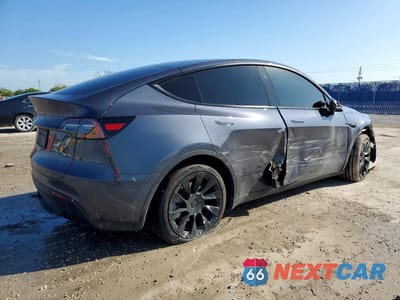Trzecie zdjęcie samochodu z tyłu: 2023 TESLA MODEL Y VIN:7SAYGDED8PF959484 - miniatura