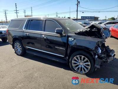 Czwarte zdjęcie samochodu z boku: 2021 GMC YUKON XL C1500 SLT VIN:1GKS1GKT5MR433034 - miniatura