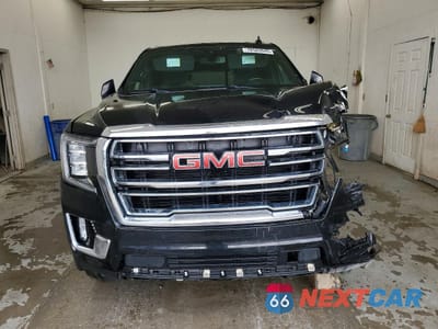 Piąte zdjęcie samochodu w środku: 2021 GMC YUKON XL K1500 SLT VIN:1GKS2GKD3MR368402 - miniatura