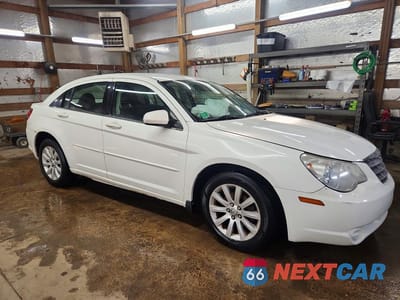 Czwarte zdjęcie samochodu z boku: 2010 CHRYSLER SEBRING LIMITED VIN:1C3CC5FB0AN147373 - miniatura