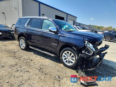 Czwarte zdjęcie samochodu z boku: 2023 CHEVROLET TAHOE C1500 PREMIER VIN:1GNSCSKD4PR343886 - miniatura