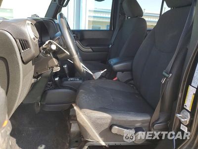 Zdjęcie 7 z 12 samochodu: 2015 JEEP WRANGLER UNLIMITED SPORT VIN:1C4BJWDG1FL770361 - miniatura