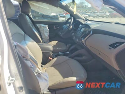 Zdjęcie 7 z 11 samochodu: 2014 HYUNDAI TUCSON SE VIN:KM8JU3AG2EU841402 - miniatura