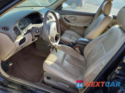 Zdjęcie 7 z 13 samochodu: 1999 OLDSMOBILE INTRIGUE GLS VIN:1G3WX52H0XF387470 - miniatura