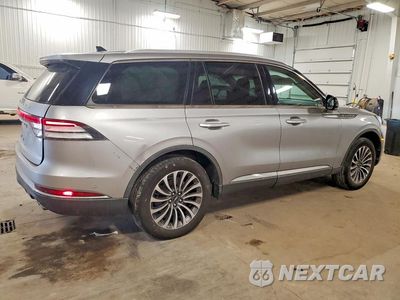 Trzecie zdjęcie samochodu z tyłu: 2021 LINCOLN AVIATOR RESERVE VIN:5LM5J7XC6MGL05326 - miniatura