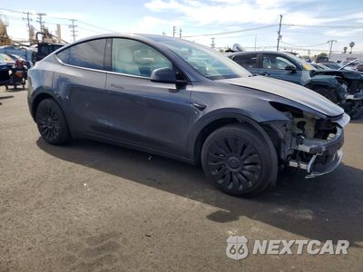 Czwarte zdjęcie samochodu z boku: 2022 TESLA MODEL Y VIN:7SAYGDEE3NF409650 - miniatura