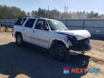 Czwarte zdjęcie samochodu z boku: 2004 CHEVROLET TAHOE C1500 VIN:1GNEC13Z54R274493 - miniatura