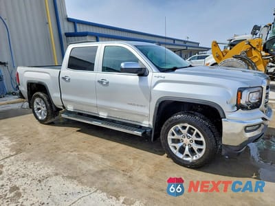 Czwarte zdjęcie samochodu z boku: 2018 GMC SIERRA K1500 SLT VIN:3GTU2NEC0JG386010 - miniatura