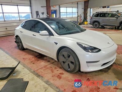 Czwarte zdjęcie samochodu z boku: 2021 TESLA MODEL 3 VIN:5YJ3E1EB3MF917956 - miniatura