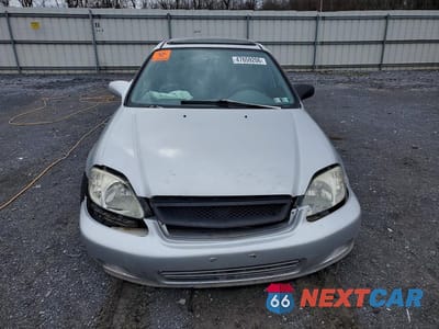 Piąte zdjęcie samochodu w środku: 1999 HONDA CIVIC EX VIN:1HGEJ8544XL037799 - miniatura