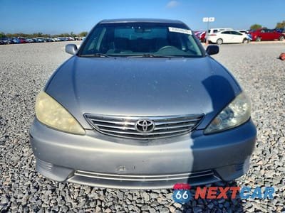 Piąte zdjęcie samochodu w środku: 2006 TOYOTA CAMRY LE VIN:4T1BE32K16U712704 - miniatura